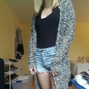 Floor length black and white crocheted sweater